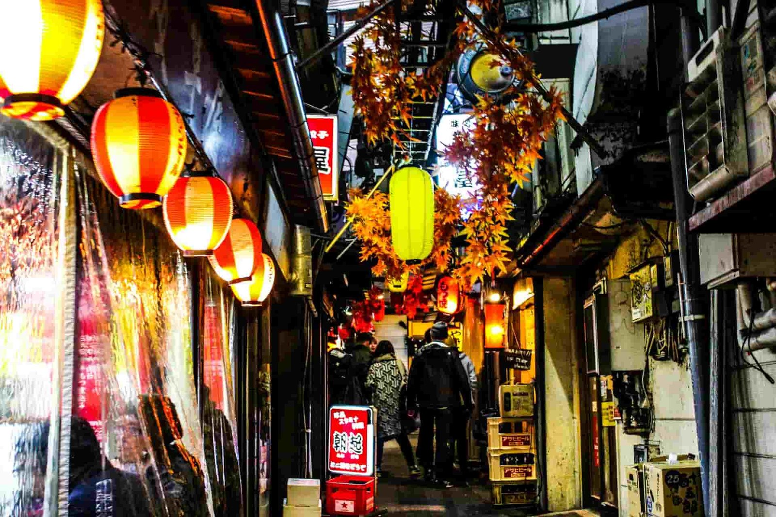 image of street with bars and lanterns in Japan.