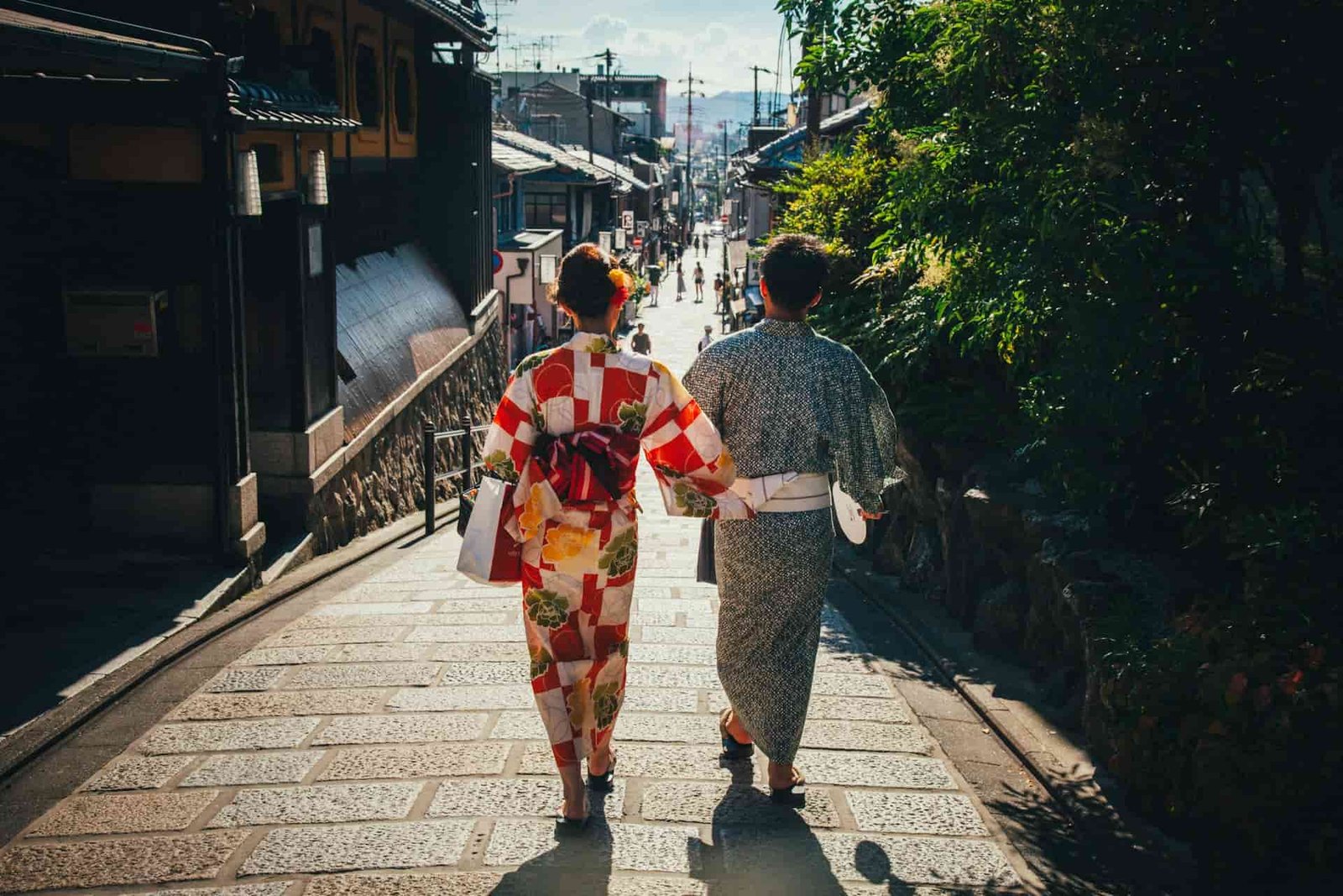 Japaense couple walking down a traditional street