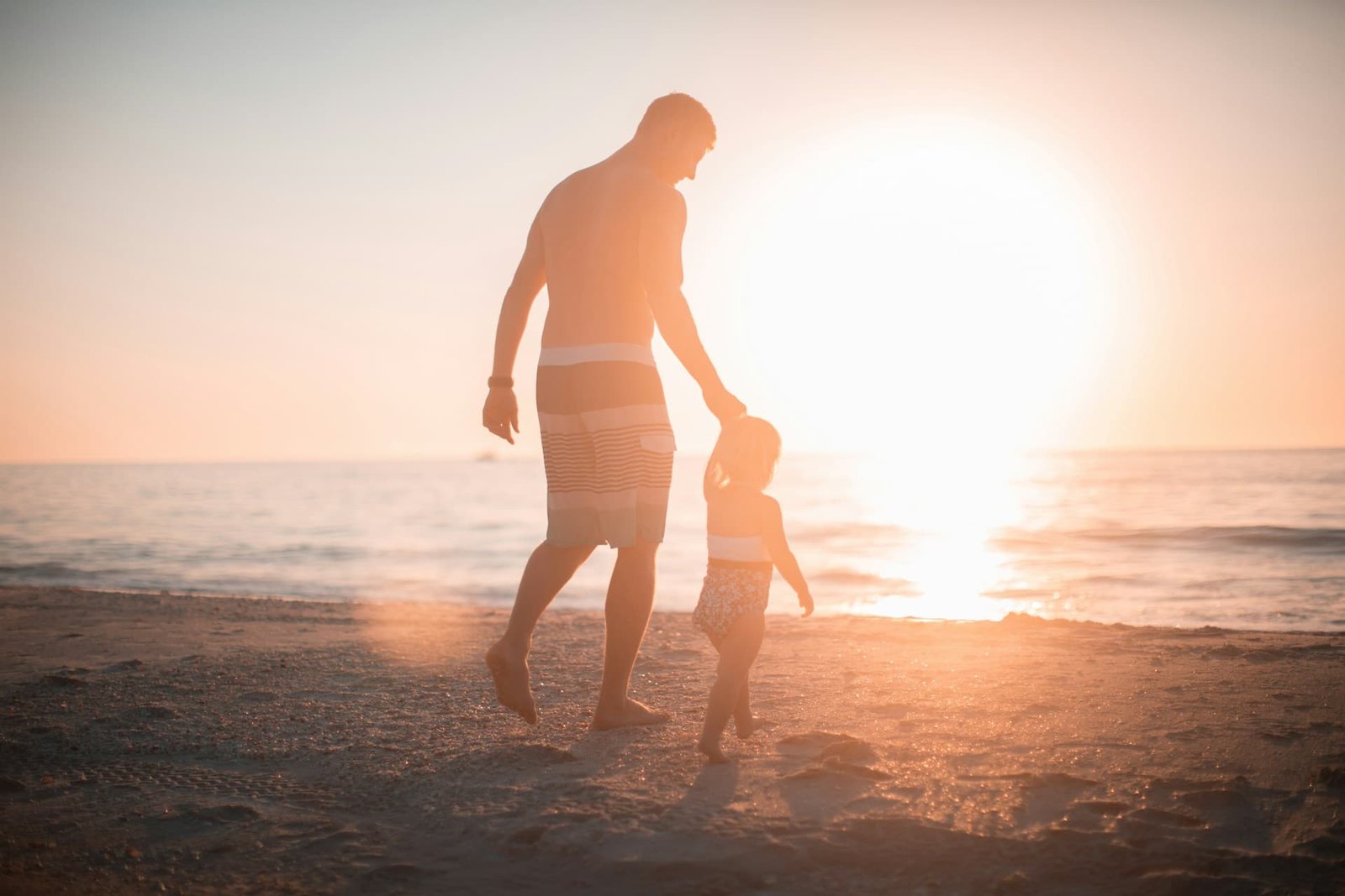 A father with his child on the beach