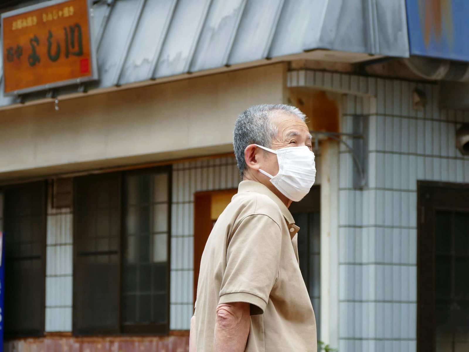 Japanese Senior wearing a mask